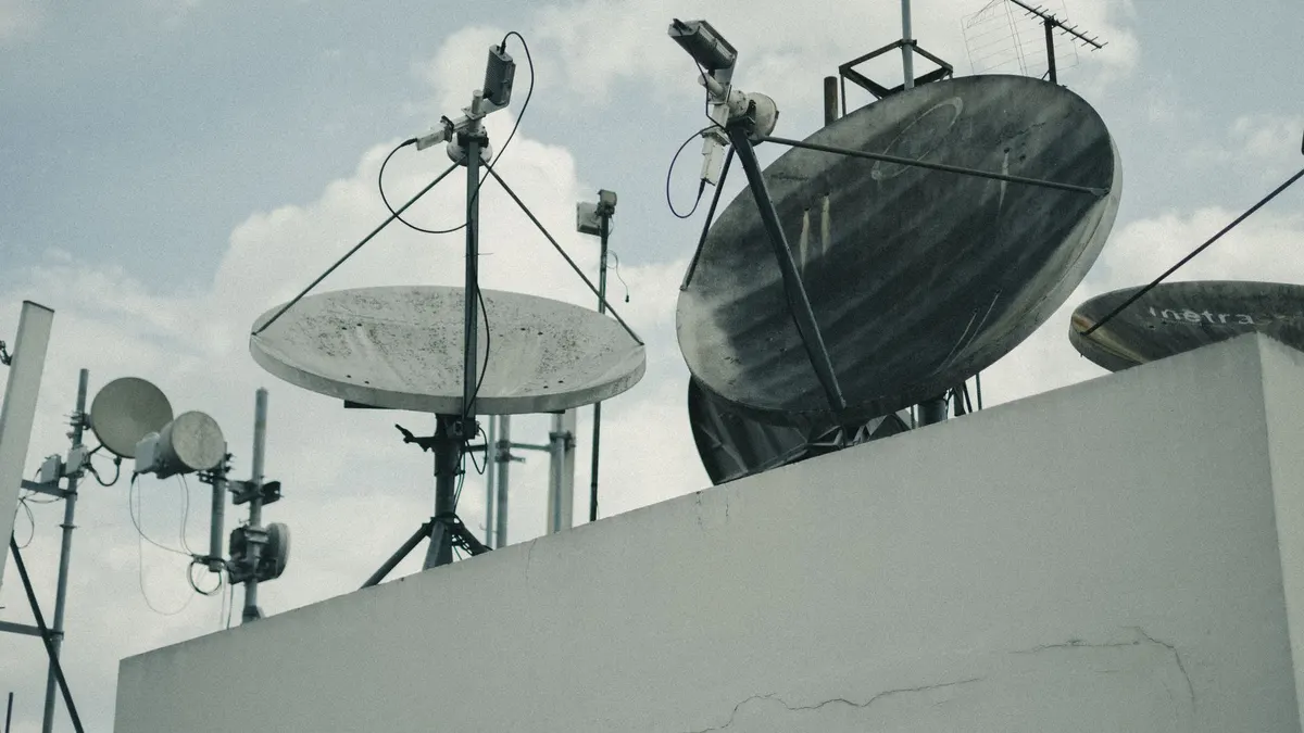 An antenna mounted against the sky