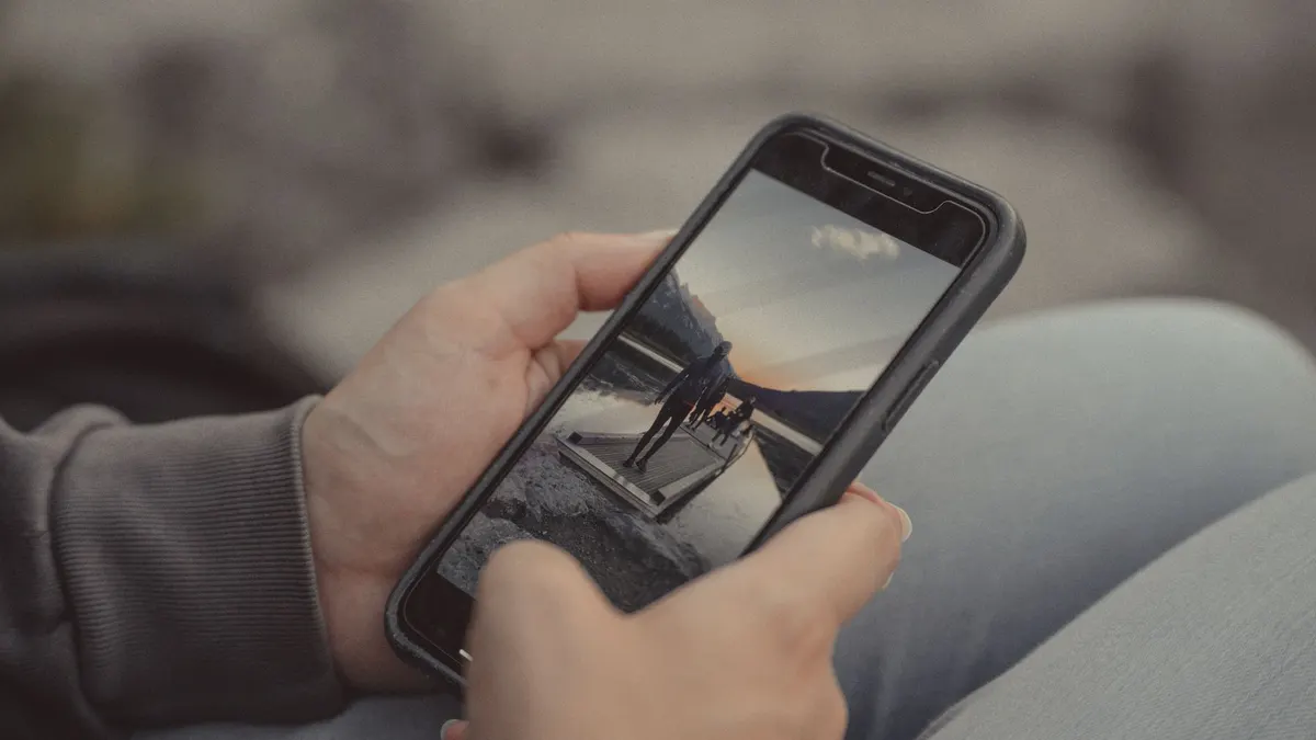 A phone held outdoors
