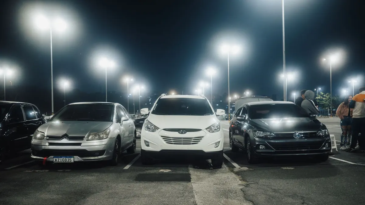 A lit parking area at night