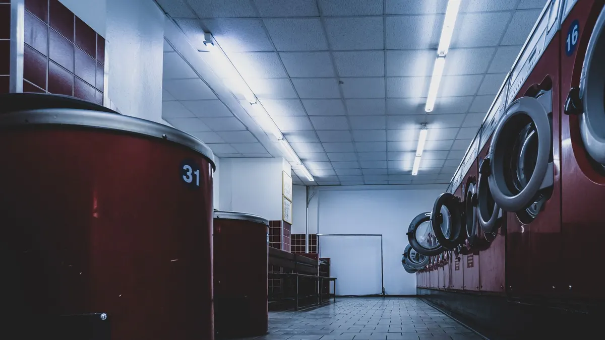 A row of laundromat machines