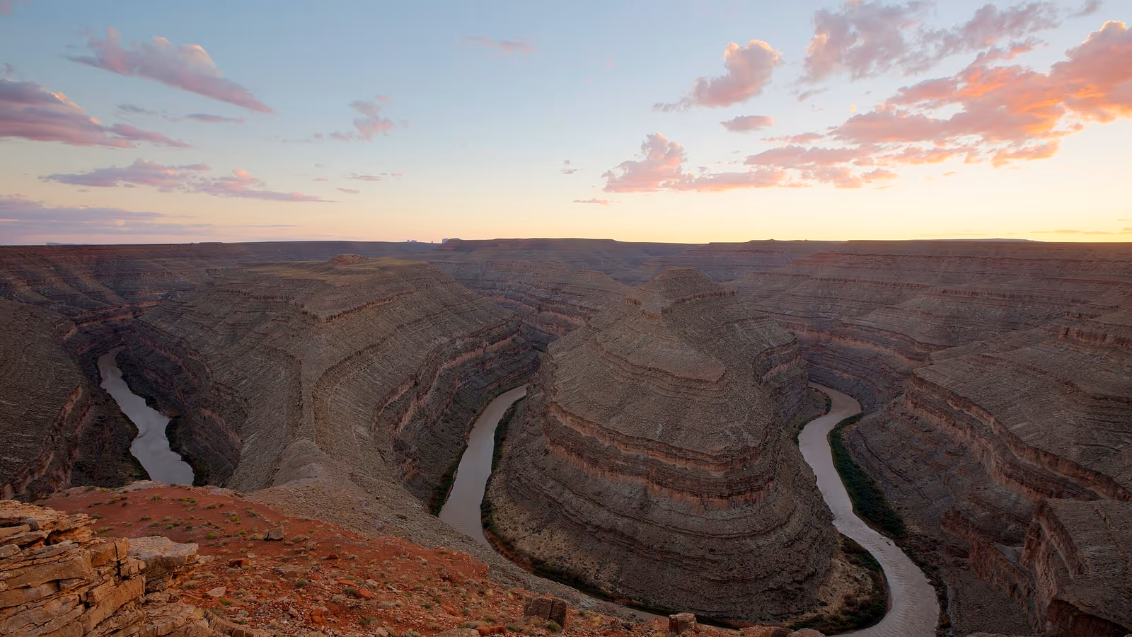 The Goosenecks of the San Juan River on BLM land in Utah at dusk