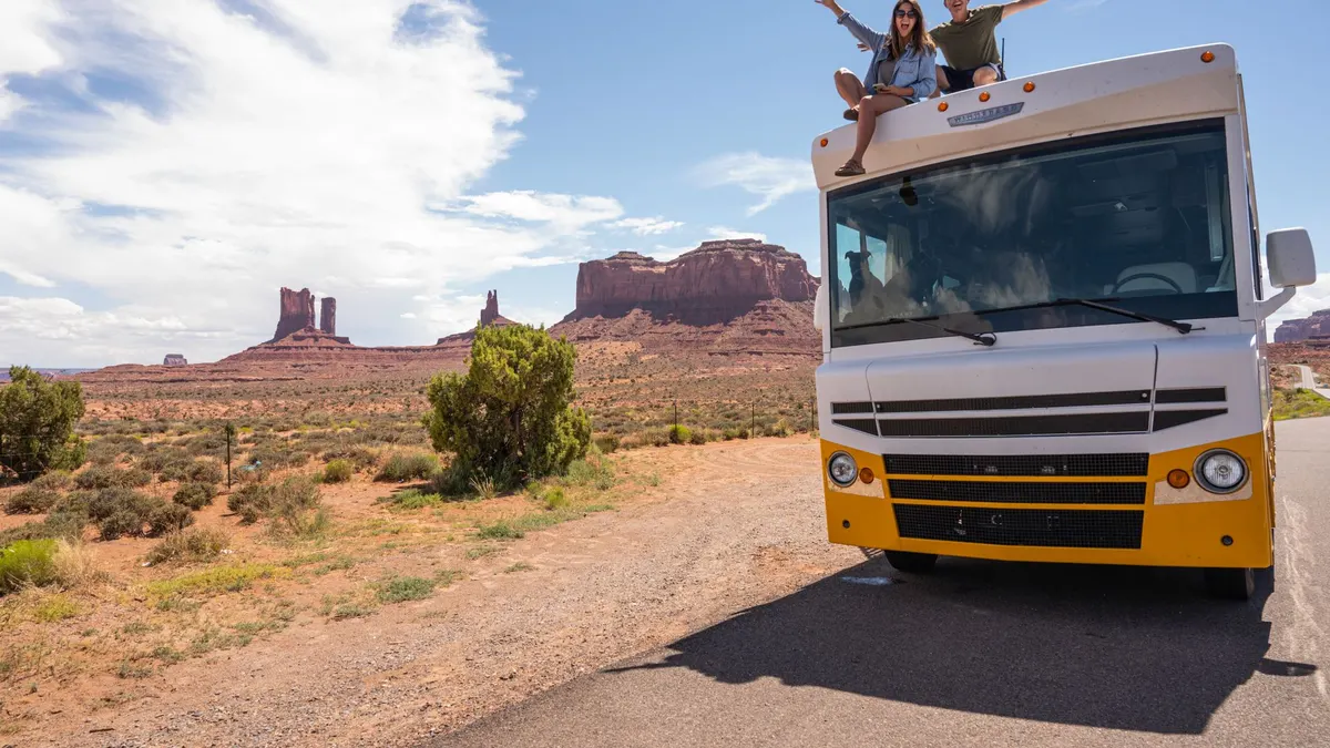 RVs spread across open desert land