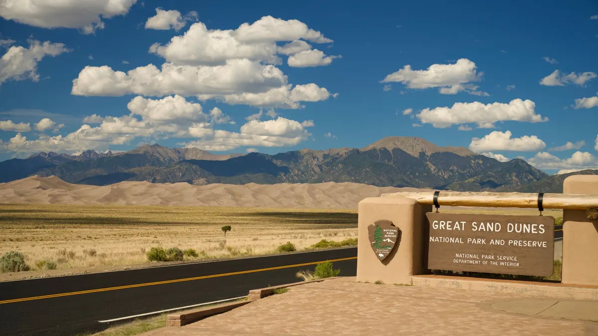 A park entrance sign